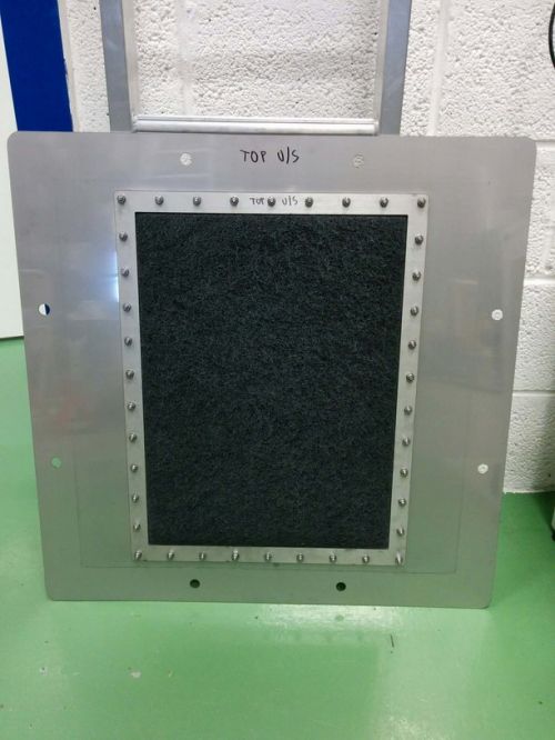 Upstream side of flat sheet media after exposure to ASHRAE 52.2 loading dust